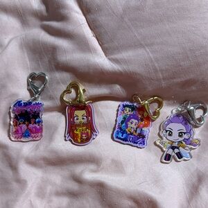 Demon Hunter Phone Charm with clear phone attachment.